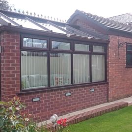A rosewood conservatory installed by our team