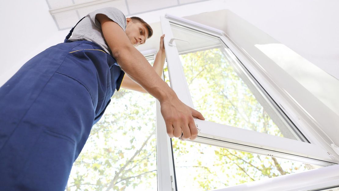 A window being repaired by one of our team