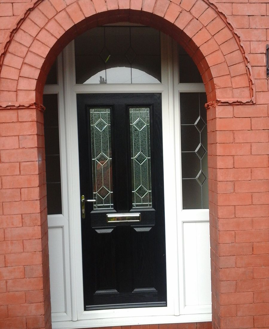 A new black door installed by our team for a residential customer